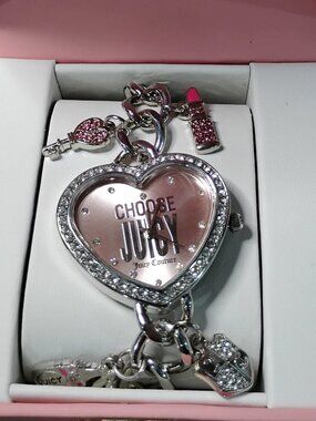 Juicy Couture silver-tone charm watch pink face accents and crystal rhinestones